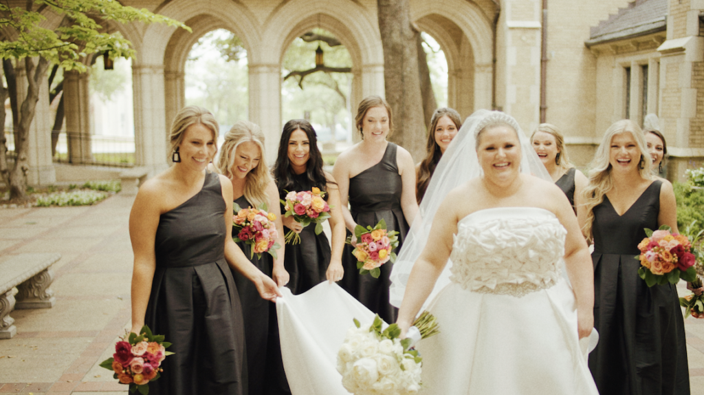 bride surrounded by bridesmaids