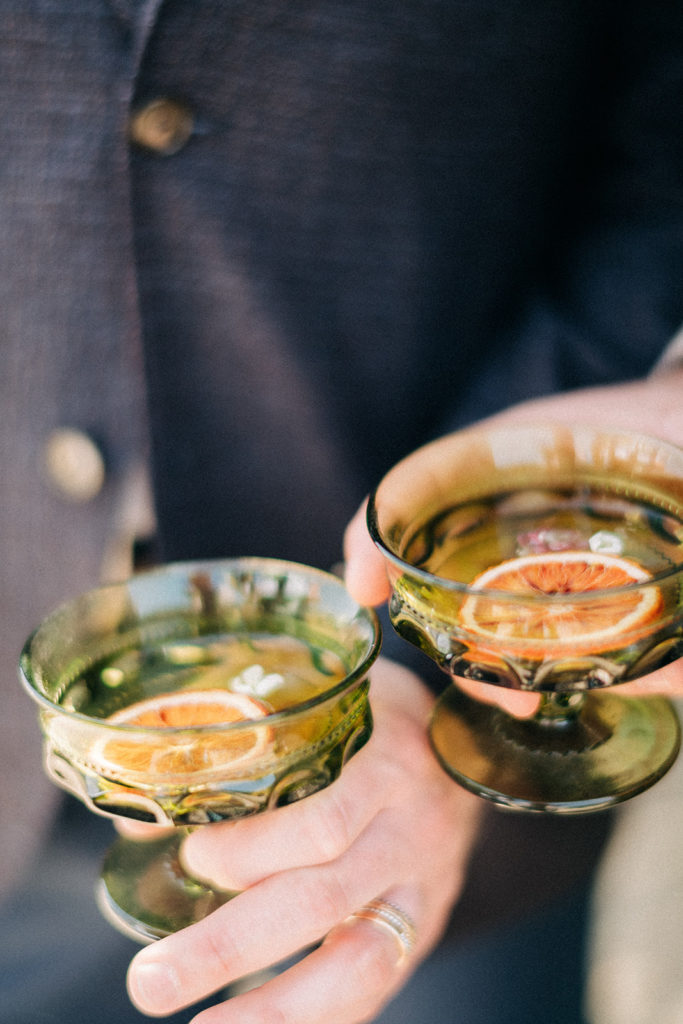 glasses with orange slices