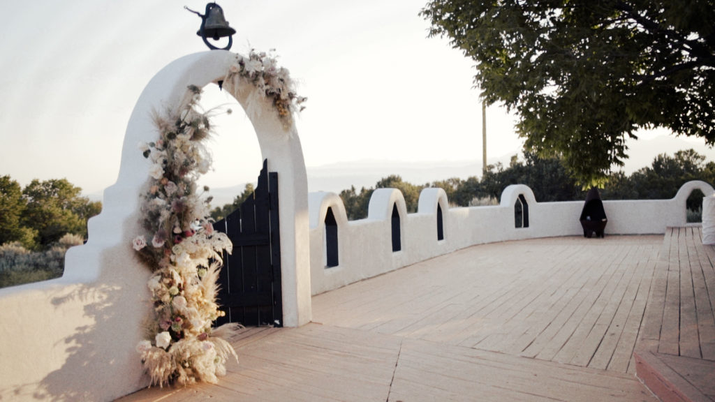 wedding altar with floral arch