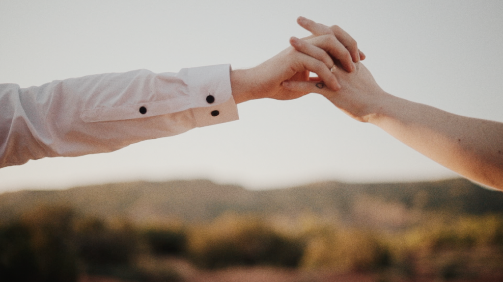 bride and groom holding hands during their texas elopement